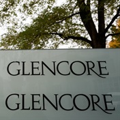 Glencore profit plunges on lower commodity prices, but investors get special dividend 