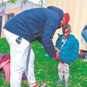 Local donates jackets to orphanage, informal settlement