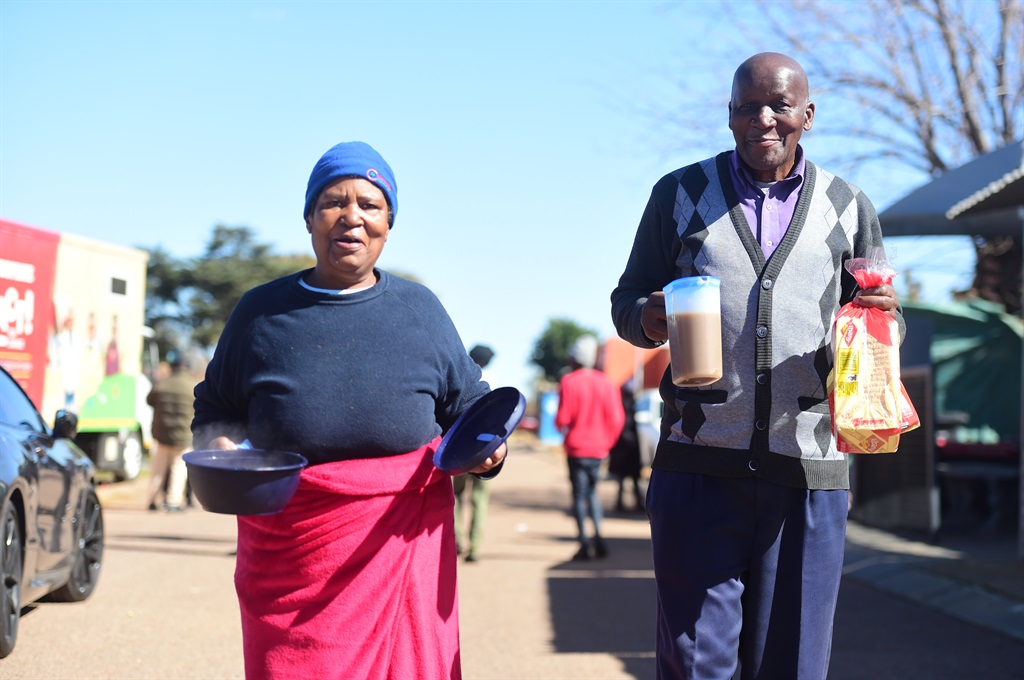 The community of Mamelodi West in Tshwane received soup and bread from NotInMyName on Tuesday. Photos by Raymond Morare
Caption Gogo Girly Khumalo (74) and Johannes Mavhundela (76) received soup in Mamelodi West on Tuesday. Photo by Raymond Morare 
