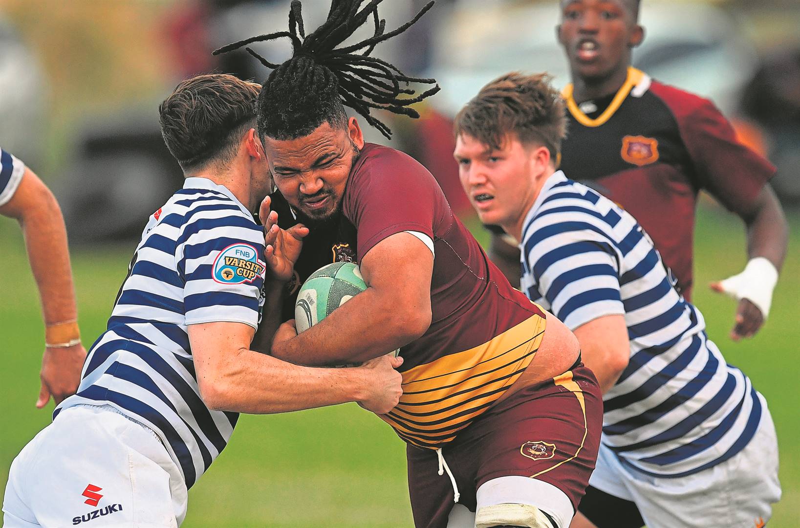 Hard man for St George’s, Lynson Andries breaks through a tackle in their clash against UCT on Saturday.Photo: Peter Bee
