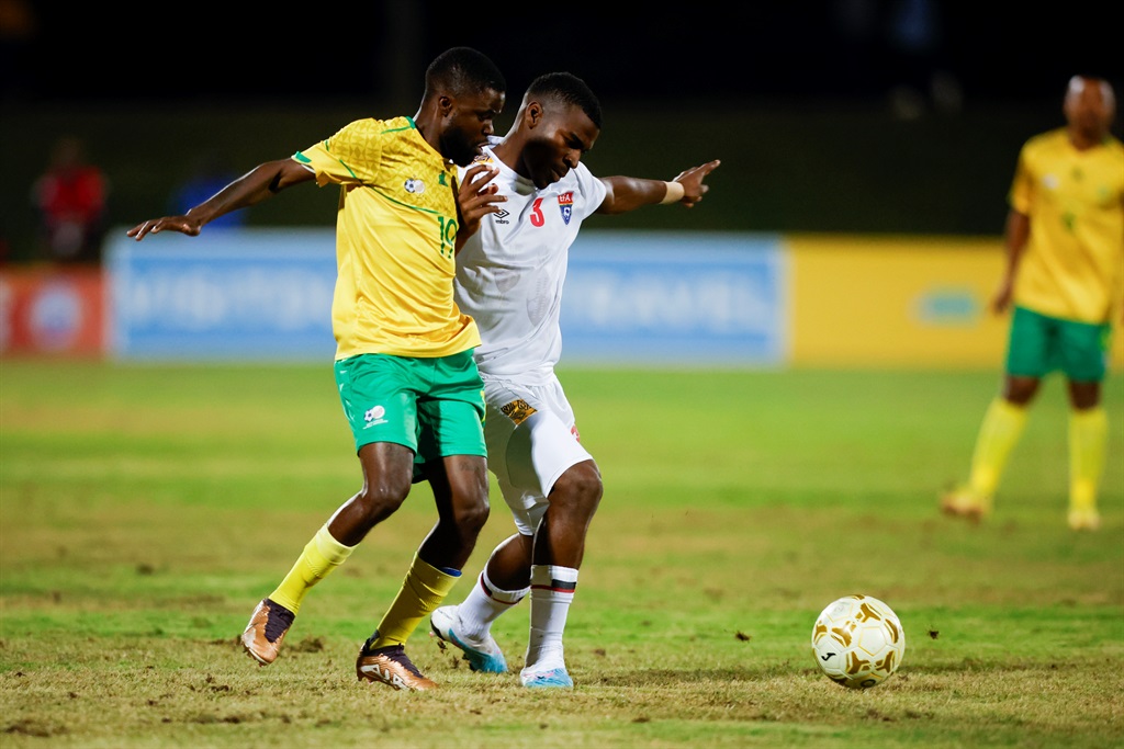 DURBAN, SOUTH AFRICA - JULY 11: Alton Lesedi Kapinga of South Africa and Kwakhe Thwala of Eswatini during the 2023 COSAFA Cup match between South Africa and Eswatini at Princess Magogo Stadium on July 11, 2023 in Durban, South Africa. (Photo by Rogan Ward/Gallo Images)