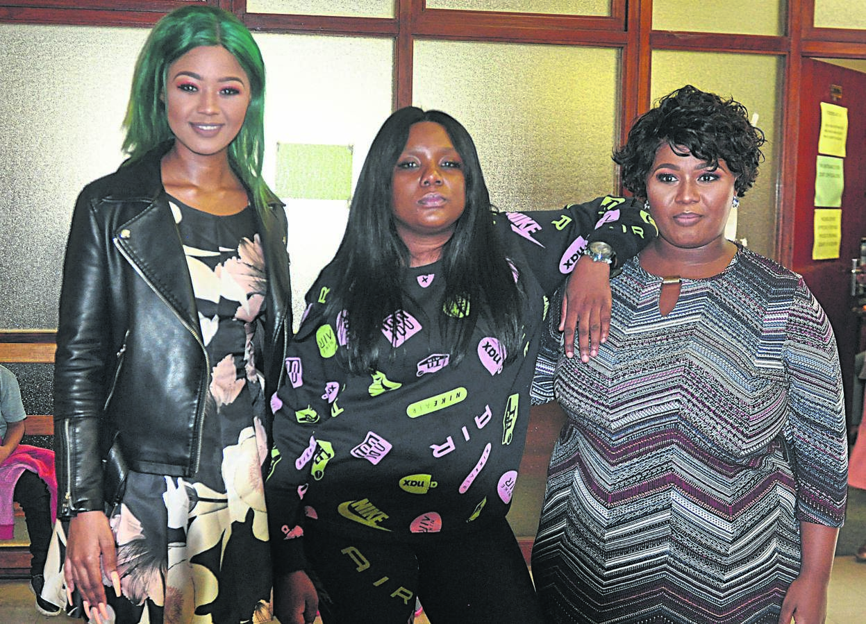 From left: Babes Wodumo, Tipcee and Nondumiso Simelane outside the Durban Magistrates Court yesterday.              Photo by Jabulani Langa