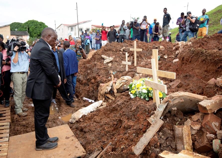 President Cyril Ramaphosa lays a wreath at a debris of a house destroyed after massive flooding in Chatsworth near Durban on  April 24, 2019. Picture: Rogan Ward/Reuters