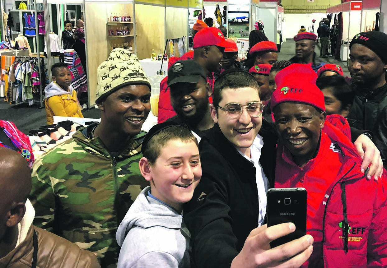 MAKING FRIENDS EFF leader Julius Malema visited the Rand Show at the Nasrec Expo Centre to drum up support for the party.                               Picture: Sthembiso Lebuso