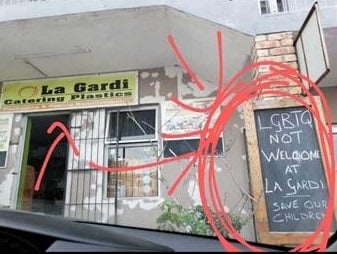 Photos of the signs written 'LGBTI not welcome at La Gardi catering plastics, save our children' caused a stir on social media as angered communities reacted to the message that was a violation of the Equality Act.  