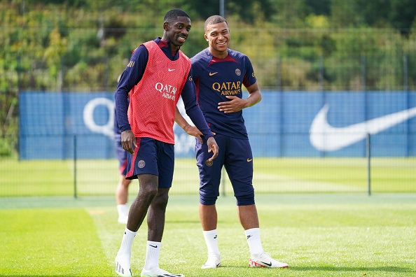 Ousmane Dembele (left) will now wear the No. 10 shirt at Paris Saint-Germain.