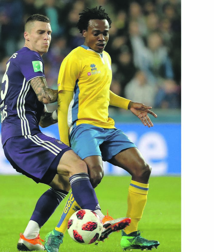 EXEMPLARY Percy Tau weaves his magic against Ognjen Vranješ of Anderlecht during a league match in Belgium. Picture: Vincent Van Doornick / Getty Images