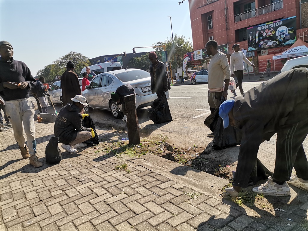 Homeless people in Mbombela dedicated their 67 minutes cleaning the town. 

Photo by Bulelwa Ginindza

