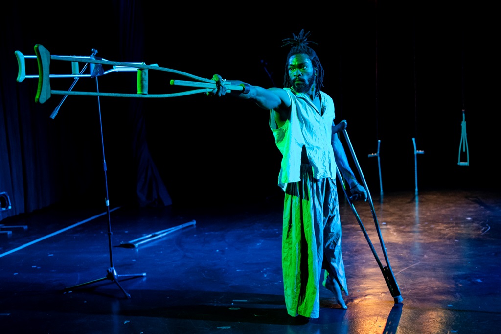 Choreographer Joseph Tebandeke showcasing his dance moves with his crutches. 