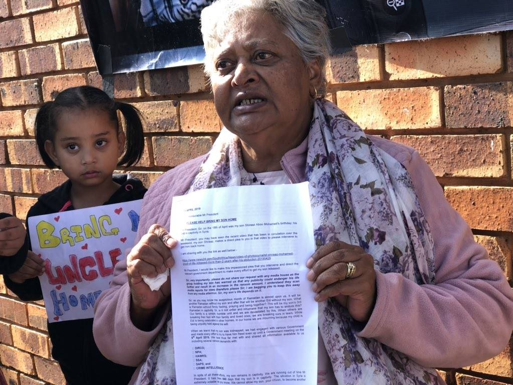 Kidnapped South African photojournalist Shiraaz Mohamed’s mother, Shireen Mohamed, pleads for President Cyril Ramaphosa to assist with her son’s release at Hitekani Primary School in Soweto. Picture: Juniour Khumalo/City Press 