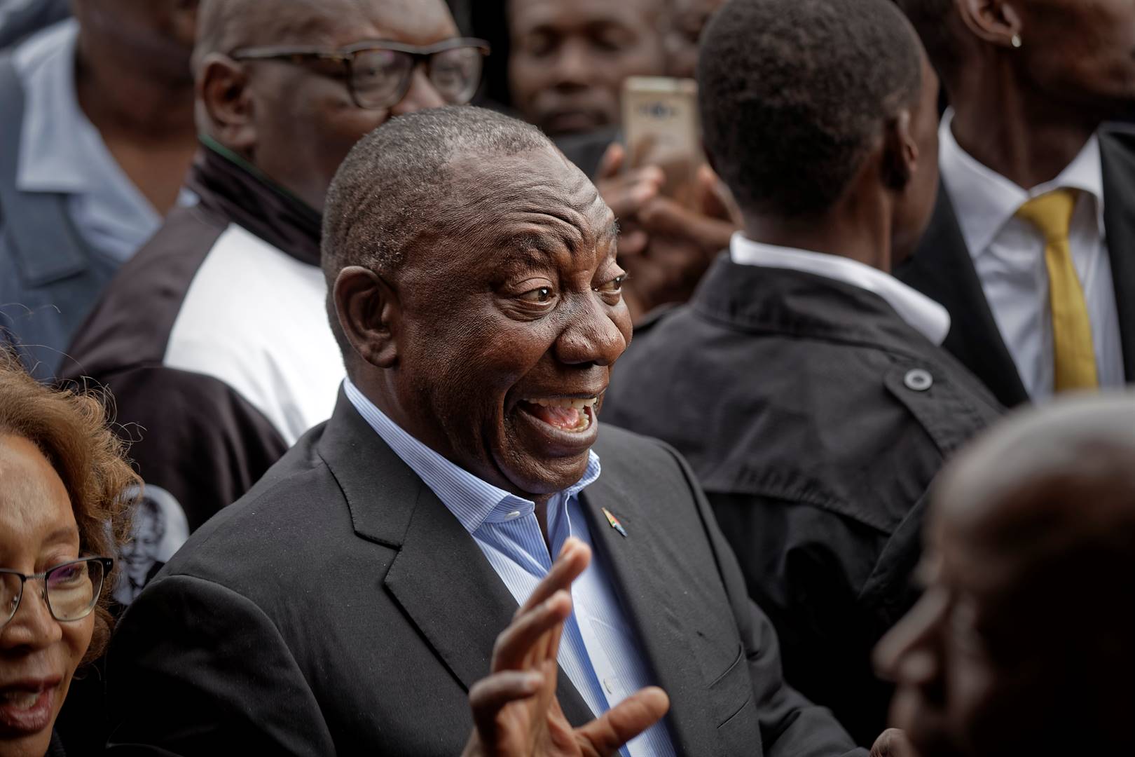 President Cyril Ramaphosa greets supporters after casting his vote at the Hitekani Primary School in Soweto. PIcture: Ben Curtis/AP