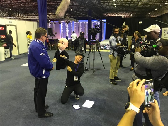<p>Puppeteering: Chester Missing grills the DA's James Selfe at the IEC's results centre in Pretoria</p>
