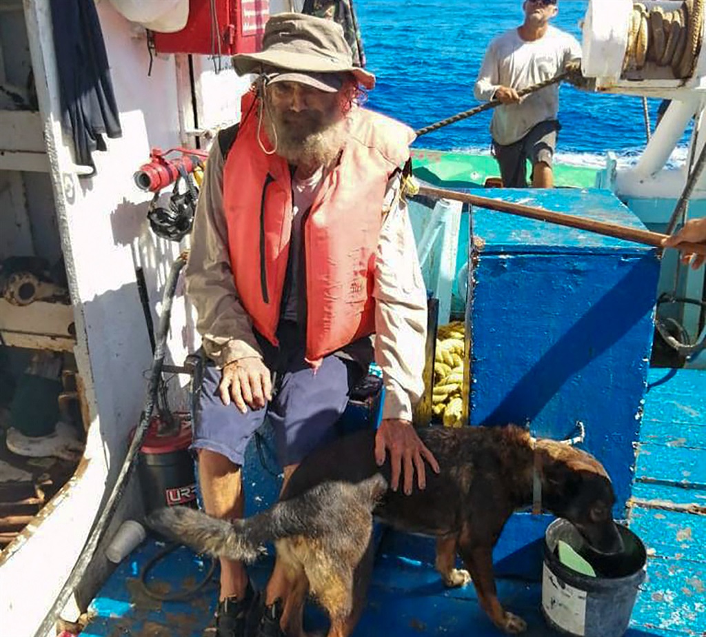  An Australian sailor rescued with his dog after m