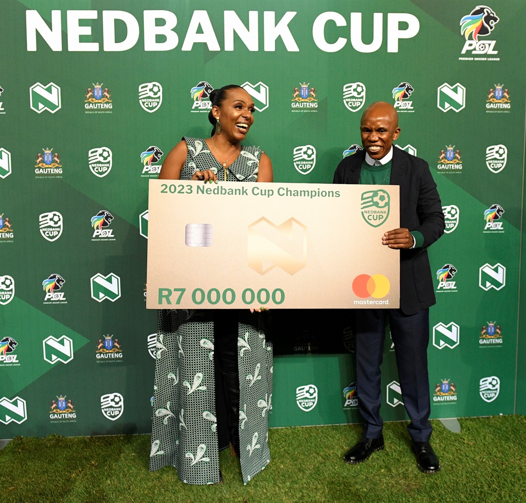 Nedbank group executive for marketing and communications Khensani Nobanda poses with Orlando Pirates senior administrator Mpumi Khoza, the son of club owner and chairperson Irvin Khoza, during the media launch and last 32 draw of the Nedbank Cup at the bank's headquarters in Sandton, Johannesburg, on 18 January 2024