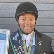 Mona-Lisa (13) is a horse-riding champion! 