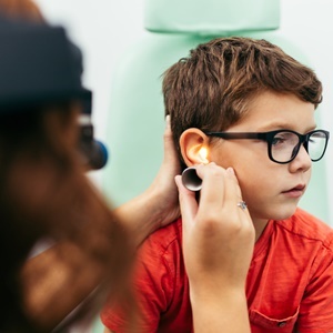 A three-year-old boy had a twig stuck at the root of his ear canal. 