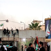 Swedish embassy in Baghdad stormed, set alight over Koran burning plans