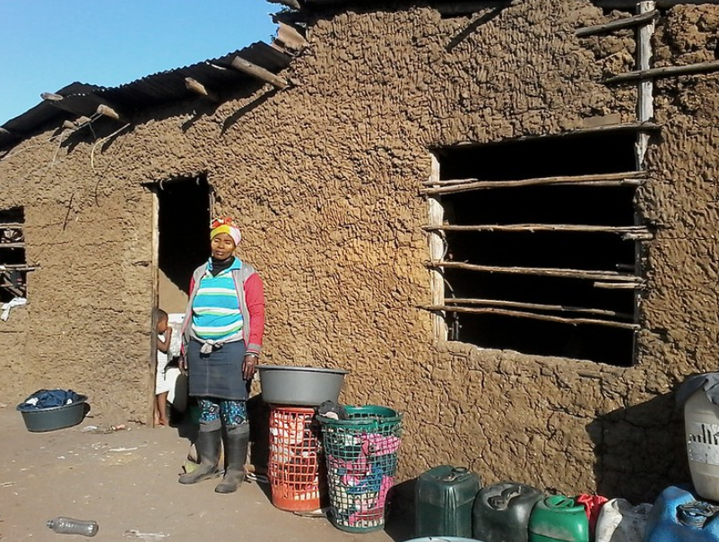 Nobuhle Mkhize lives with her five daughters and six grandchildren in a three-roomed mud house she built. (Photo: Nokulunga Majola/GroundUp)