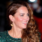 Shining, shimmering Kate! The Duchess of Cambridge steps out for a night at the theatre