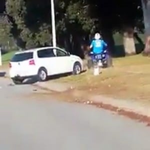 The quad biker leaves the scene on Sedan Street. (Screengrab)