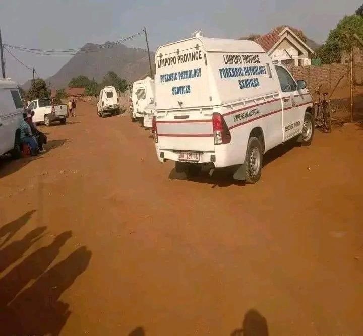 A mortuary van at the scene after the child's body was exhumed. 
Photo supplied.