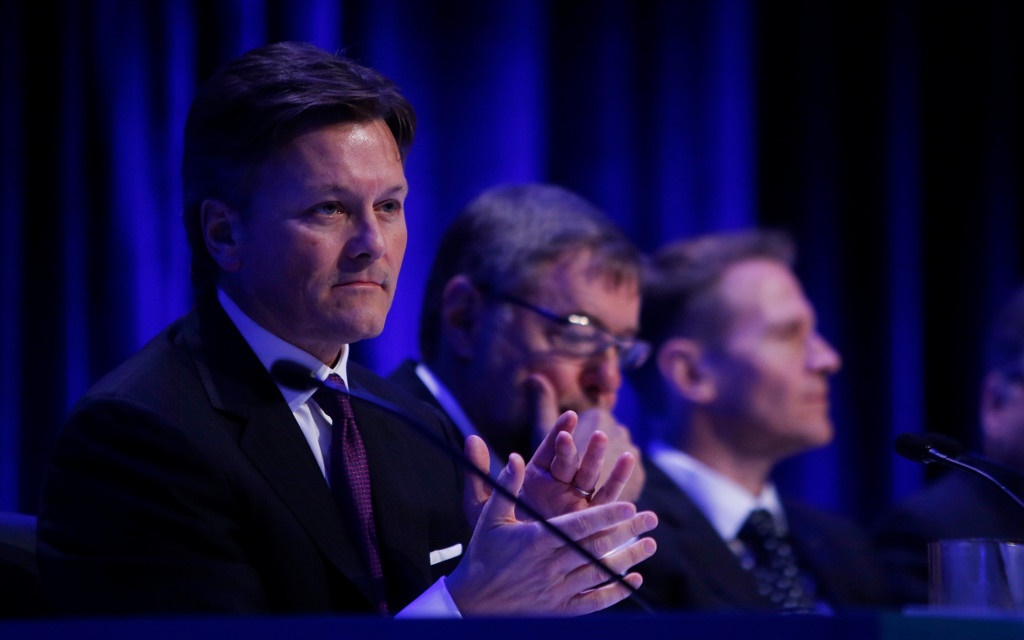 AngloGold CEO Kelvin Dushinsky claps during his previous position as the co-president of Barrick Gold at a meeting in Toronto, Canda, in 2018. (Cole Burston/Toronto Star via Getty Images)
