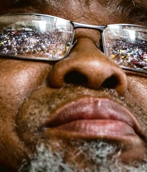 Protesters from Wits and the University of Johannesburg are reflected on the lenses of ANC secretary-general Gwede Mantashe’s glasses outside Luthuli House. Mantashe writes that the ANC and the protesting students are on the same side. PHOTO: Cornel 