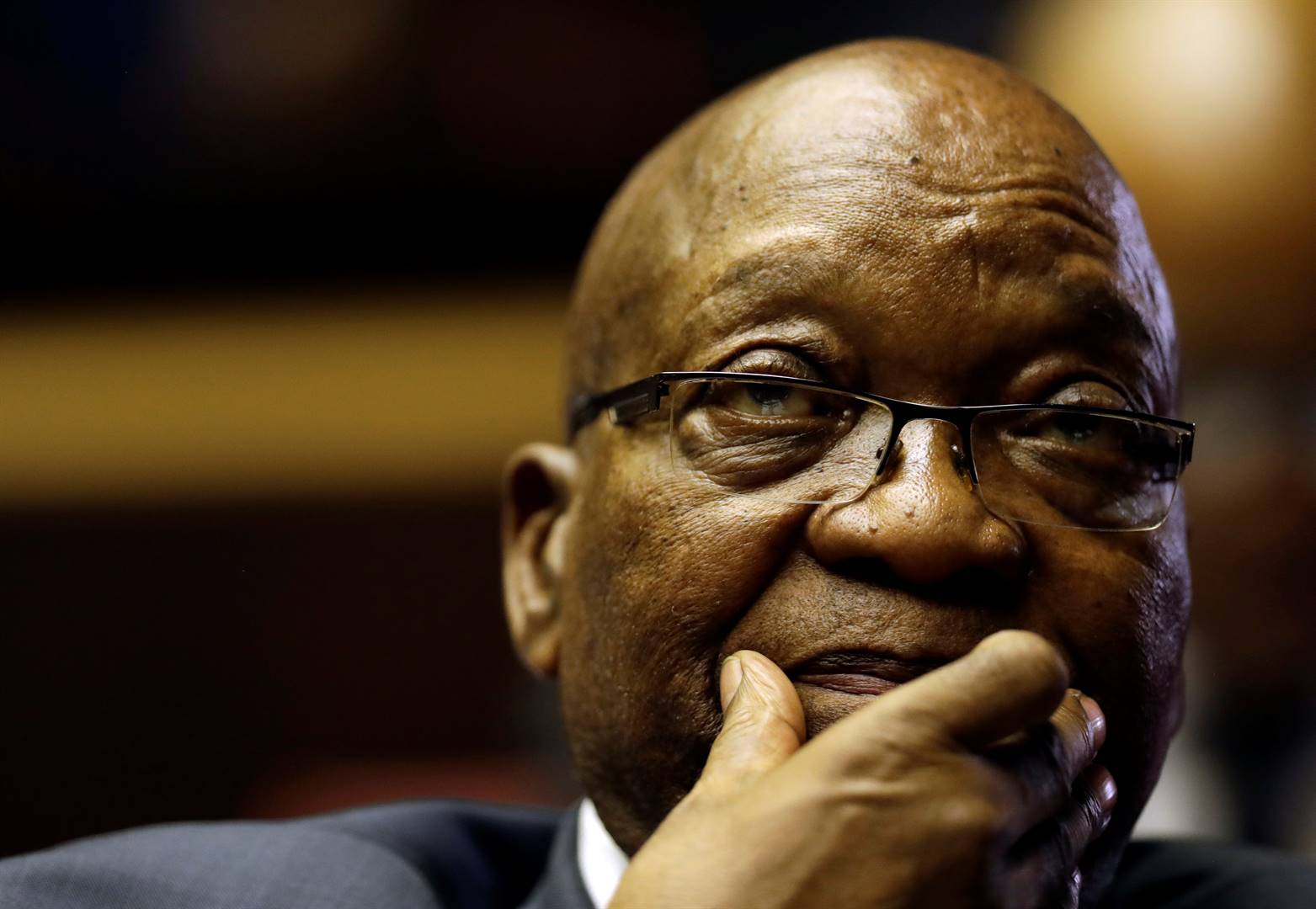 Former president Jacob Zuma sits in court during a break while facing charges that include fraud‚ corruption and racketeering in Pietermaritzburg. Picture: Themba Hadebe/Reuters