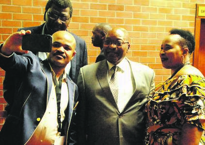 Left, from top: KZN speaker Meshack Radebe, Mandla Matutu, former president Jacob Zuma and Hlobisile Dlamini take photos at the Pietermaritzburg High Court.     Photo byPhumlani Thabethe