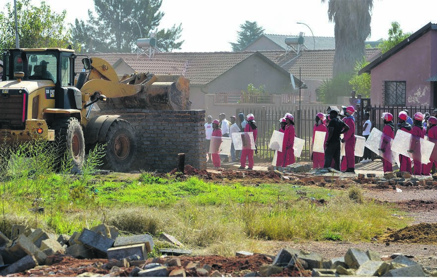 Residents of Lenasia can’t do anything to stop the demolition of their houses.Photo by Trevor Kunene