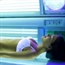 Why do young women get addicted to indoor tanning?