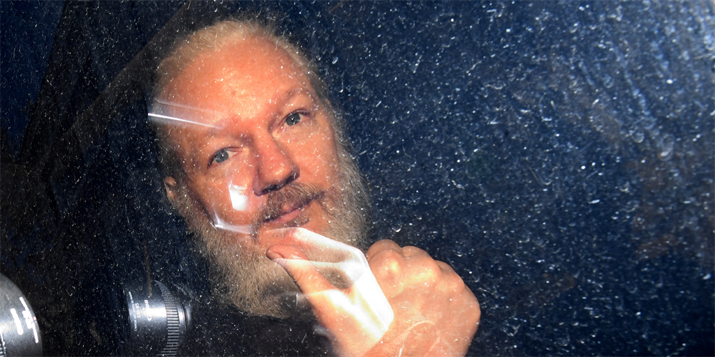 Julian Assange arrives at Westminster Magistrates' Court in London after his arrest on April 11.