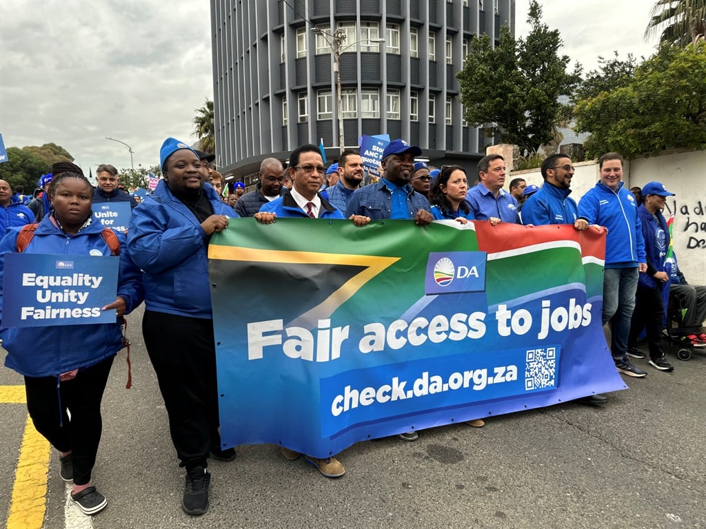 DA leader John Steenhuisen (fourth from right) at the party's march to Parliament to voice their concern about race quotas.