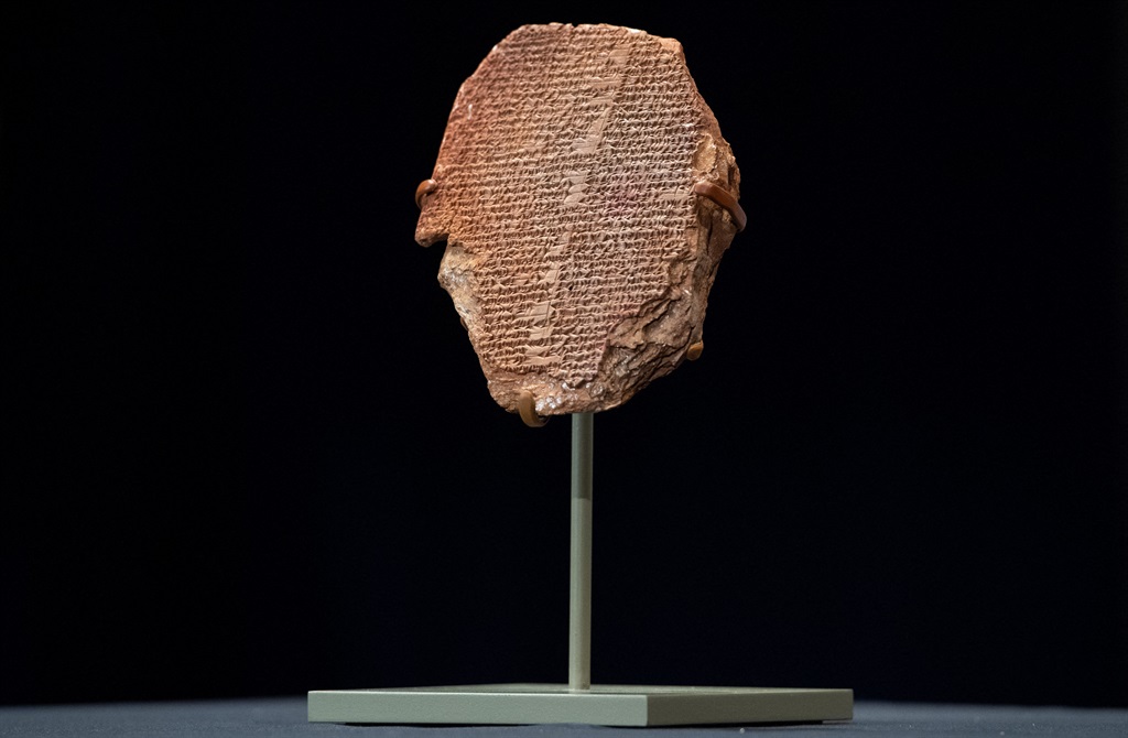 The Gilgamesh Tablet, a 3,500-year-old Mesopotamian cuneiform clay tablet that was believed to be looted from Iraq around 1991 and illegally imported into the US to be displayed at the Washington Museum of the Bible, is seen during a ceremony to repatriate the tablet to Iraq. (SAUL LOEB / AFP)


