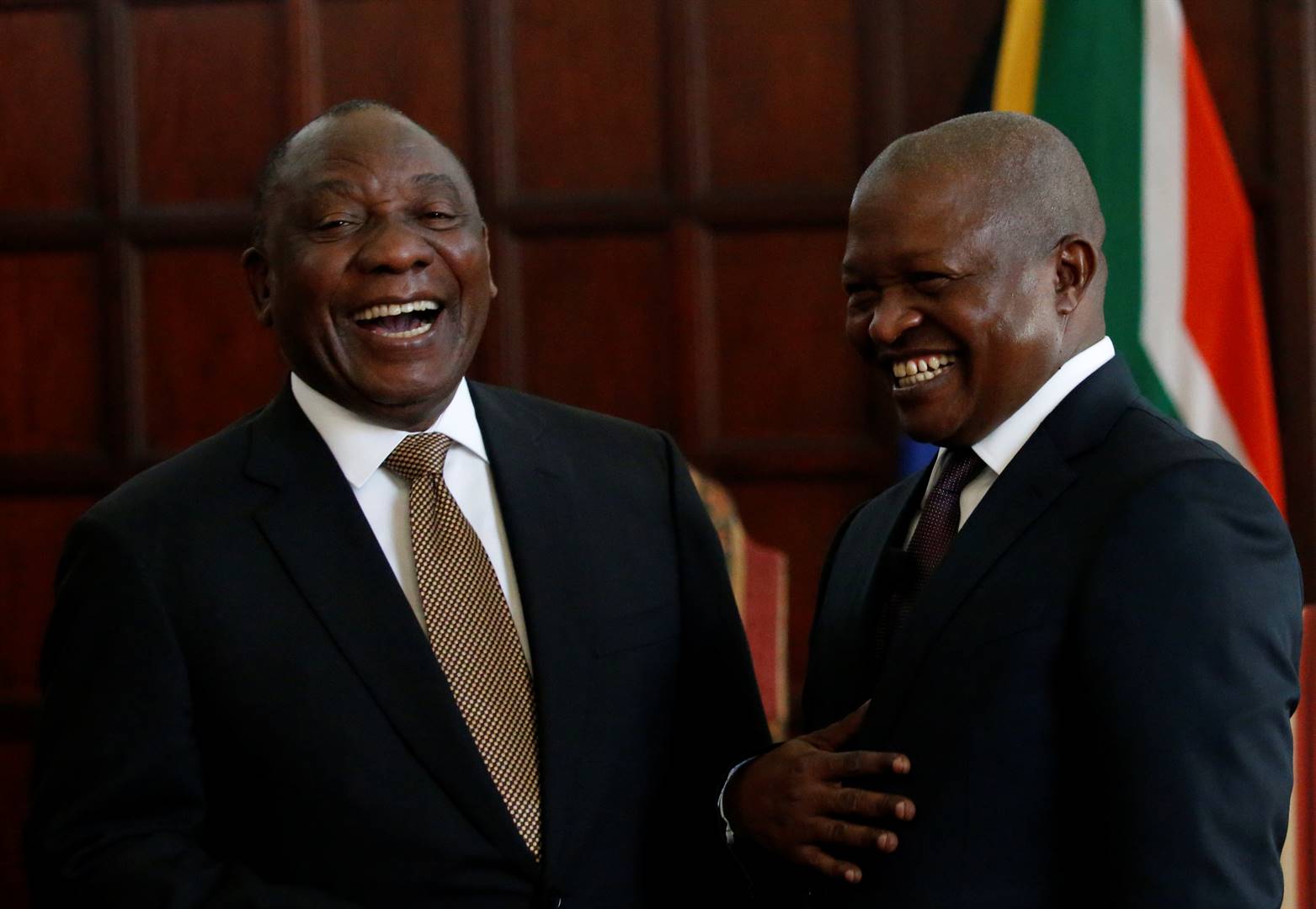  Cyril Ramaphosa laughs with Deputy President David Mabuza after he was sworn in as lawmaker in Pretoria on Tuesday (May 28 2019). Picture: Siphiwe Sibeko/Reuters