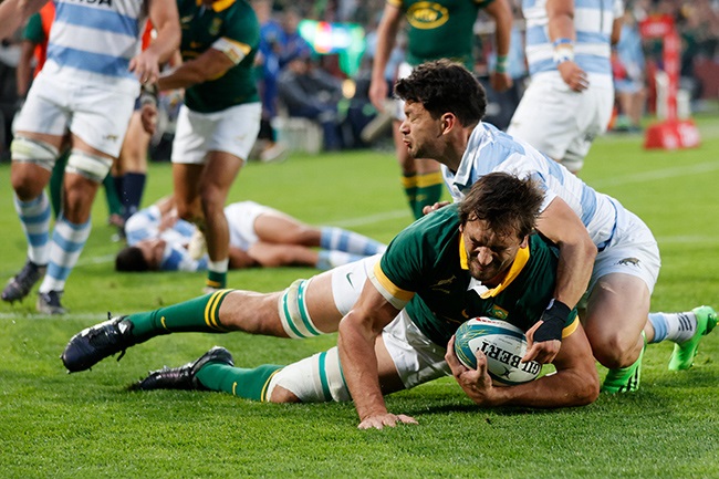 Bok lock Eben Etzebeth scores the game's first try. (Photo by PHILL MAGAKOE/AFP)