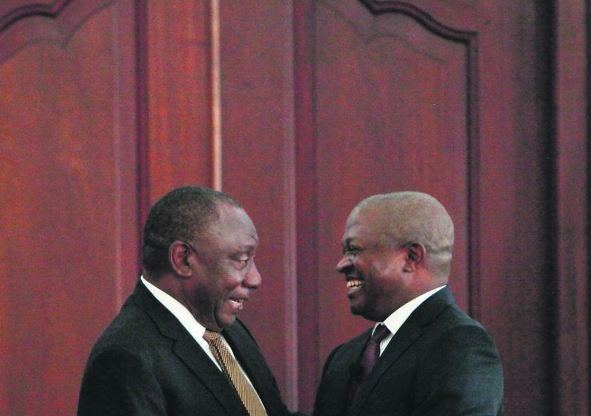 ALL SMILES David Mabuza shares a light-hearted moment with President Cyril Ramaphosa after Mabuza was sworn in as a member of Parliament by Chief Justice Mogoeng Mogoeng on Wednesday at the presidential guesthouse in Pretoria. Picture: Alaister Russell / The Sunday Times