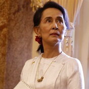 Myanmar junta cuts six years from Suu Kyi's 33-year jail term
