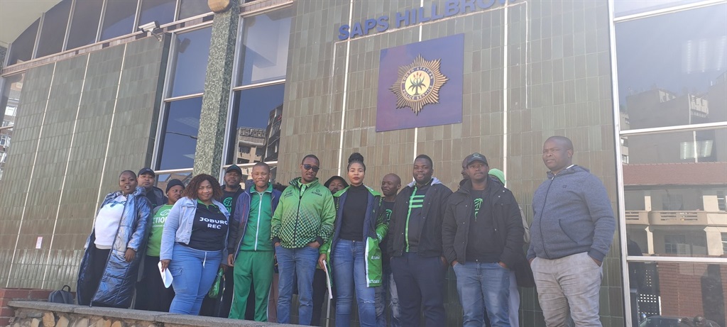 ActionSA's Nobuhle Mthembu and fellow party members outside the Hillbrow police station where they laid criminal charges against the City of Johannesburg's Economic Development MMC, Nomoya Mnisi.