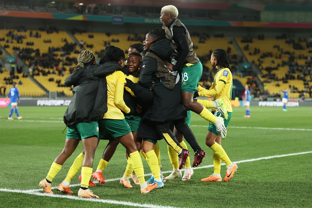 Thembi Kgatlana of South Africa celebrates with teammates after scoring her teams third goal during the FIFA Womens World Cup.