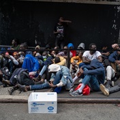 Migrants sleep outside as New York mayor says city is full