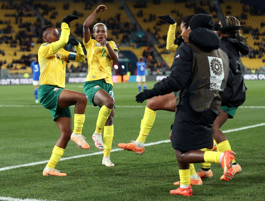 WELLINGTON, NEW ZEALAND - AUGUST 02: Thembi Kgatlana of South Africa celebrates with teammates after scoring her teams third goal during the FIFA Womens World Cup Australia & New Zealand 2023 Group G match between South Africa and Italy at Wellington Regional Stadium on August 02, 2023 in Wellington, New Zealand. (Photo by Lars Baron/Getty Images)