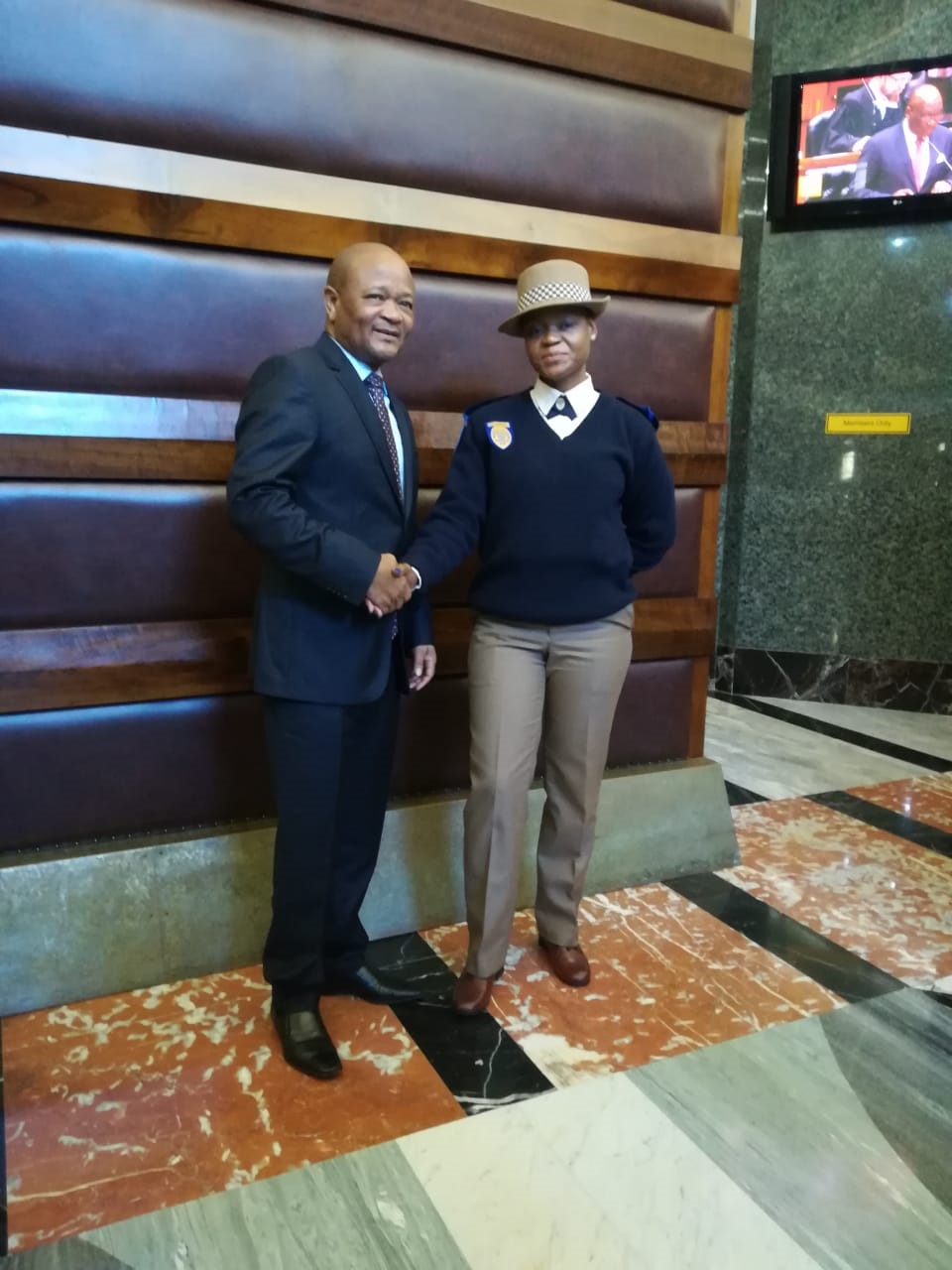 Public Service and Administration Minister Senzo Mchunu with ohannesburg Metro Police Department Officer Lebo Mngomezulu in Parliament