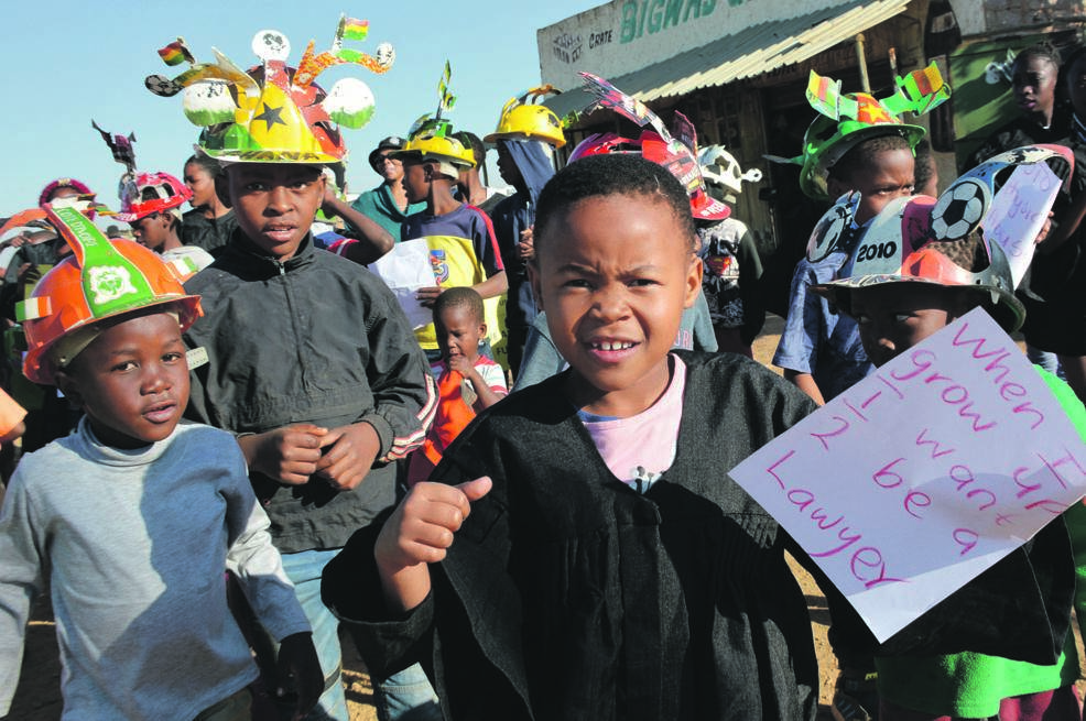 Children from Bright Horizon Community Centre in Phomolong marched on the streets during Child Protection Week to demand safety.                    Photo by Morapedi Mashashe