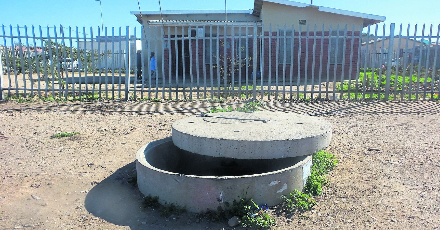 This large manhole outside the councillor’s office at Wells Estate is a danger.Photo by Joseph Chirume 