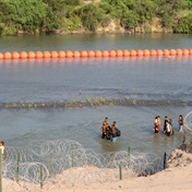 Body found in river buoys at Mexico border amid criticism of policy