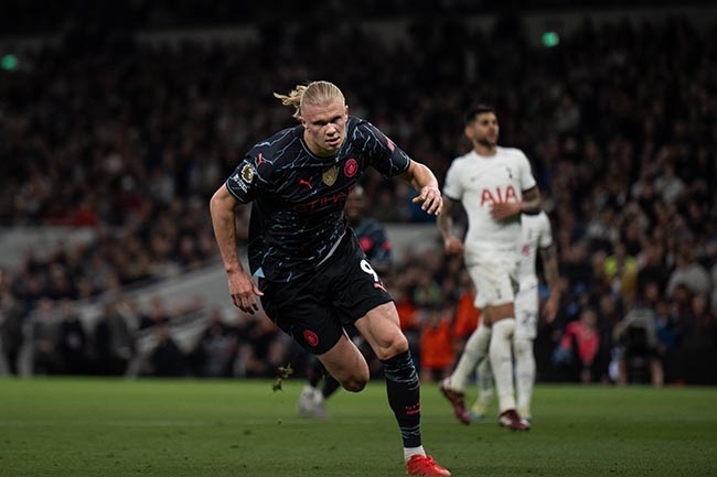 Manchester City's Erling Haaland celebrates after scoring his second goal during the Premier League match against Tottenham at Tottenham Hotspur Stadium in London on 14 May 2024. (Sebastian Frej/MB Media/Getty Images)