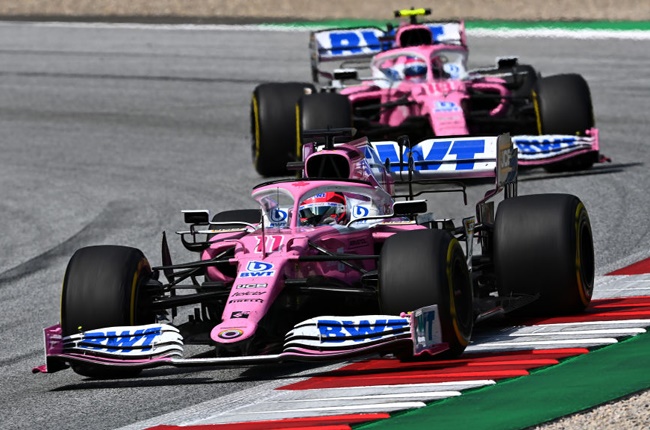 Sergio Perez, driving the (11) Racing Point RP20 Mercedes, leads team mate Lance Stroll during the Formula 1 Styrian Grand Prix. (Clive Mason / Getty Images)