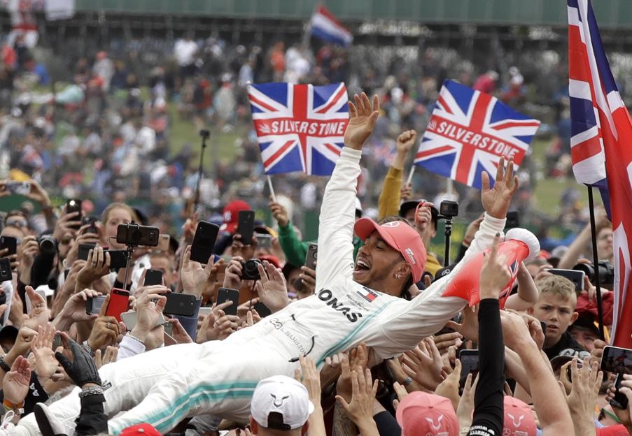 Mercedes driver Lewis Hamilton of Britain celebrates after winning the British Formula One Grand Prix. Picture: Luca Bruno/AP