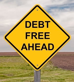 Debt Free Caution Sign With Landscape Background